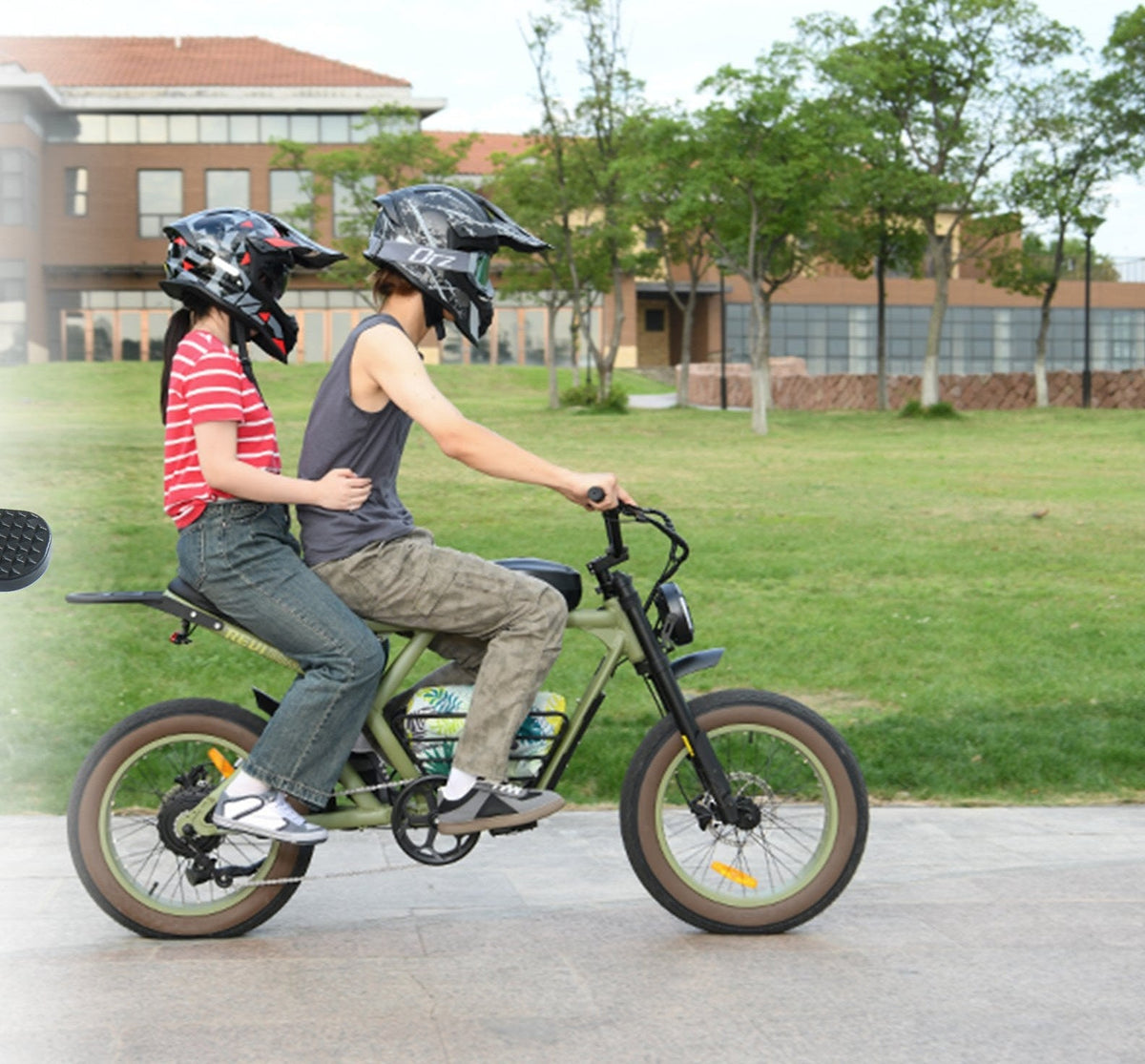Rider and passenger together on a ROOTS RIDER Cougar electric bike on a campus path